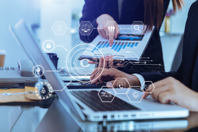 Copyright or patent concept, Business team analyzing data and using smart phone and tablet with virtual screen copyright icon trademark license, Creation ownership against piracy.