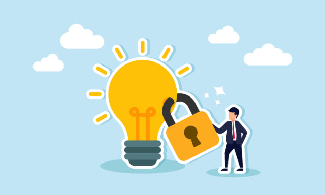 Intellectual property safeguarded by patents, copyrights, and trademarks, preventing duplication concept, businessman owner standing with light bulb idea locked with padlock for patents.